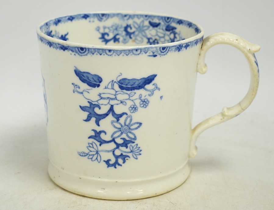 An early Victorian blue and white bone china mug, 13cm high. Condition - fair, crack to the handle